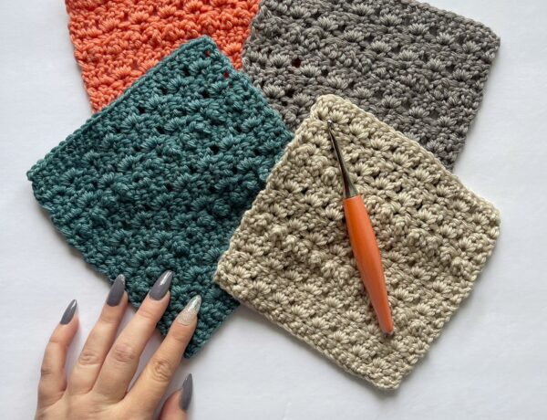 A set of four crochet squares on a white background with a peach crochet hook